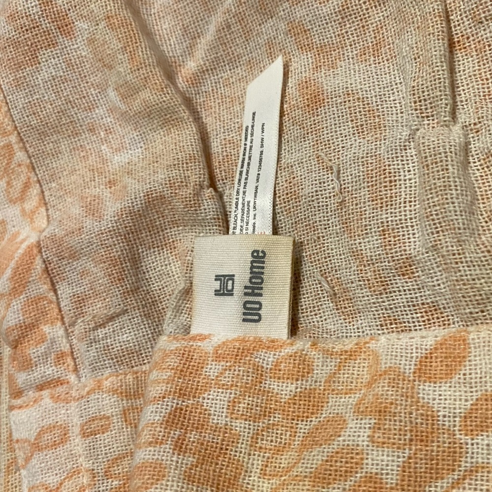 Urban Outfitters shower curtain in peach and white
